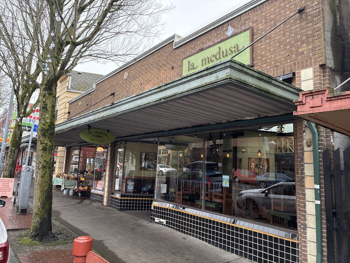 La Medusa Sicilia storefront on a rainy day in Columbia City, Seattle.