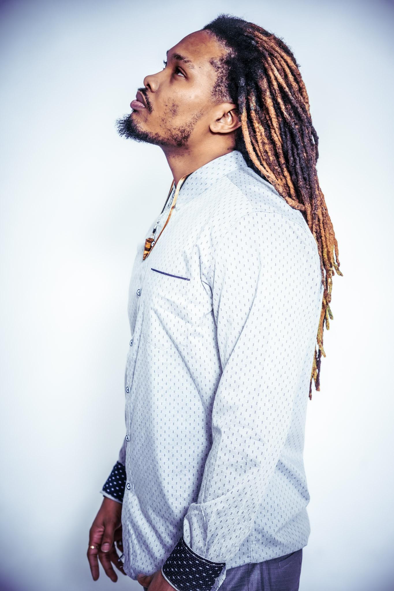 Artist-supplied side-profile portrait of Indigo Kirk3. Photograph by Echo The Savage.